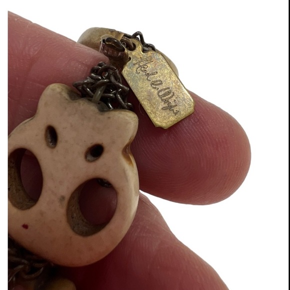 Signed Skull ivory color distressed stretch bracelet with mini chains - Picture 7 of 11